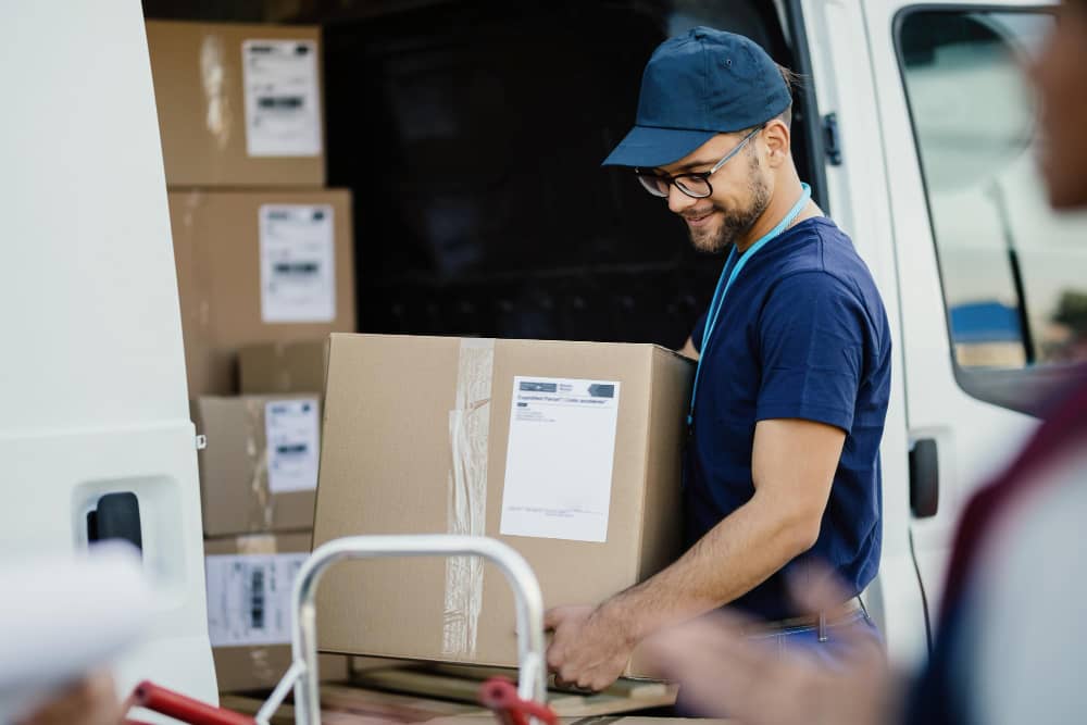 young_manual_worker_unloading_ca.jpg
